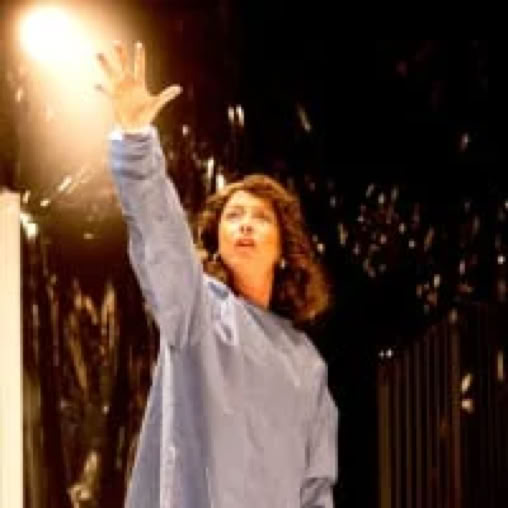 Belinda McGuirk holds the torch aloft